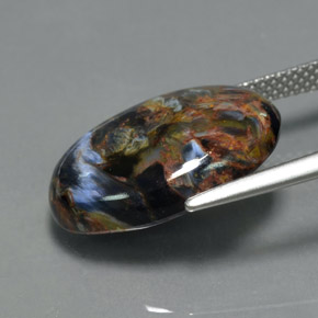 Pietersita multicolorido natural 8,29ct, corte oval, opaco