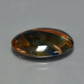 Pietersita multicolorido natural 6,70ct, corte oval, opaco