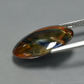 Pietersita multicolorido natural 6,70ct, corte oval, opaco