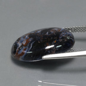 Pietersita multicolorido natural 12,34ct, corte oval, opaco