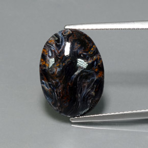 Pietersita multicolorido natural 7,09ct, corte oval, opaco
