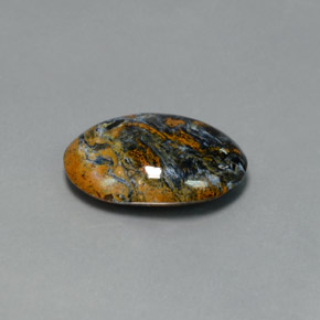 Pietersita multicolorido natural 7,33ct, corte oval, opaco