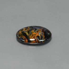 Pietersita multicolorido natural 4,67ct, corte oval, opaco