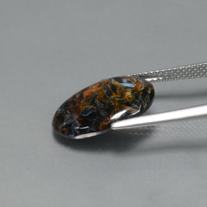 Pietersita multicolorido natural 4,67ct, corte oval, opaco