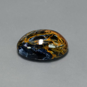 Pietersita multicolorido natural 11,81ct, corte oval, opaco