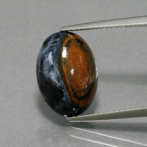 Pietersita multicolorido natural 5,18ct, corte oval, opaco