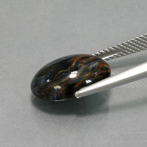 Pietersita multicolorido natural 5,20ct, corte oval, opaco