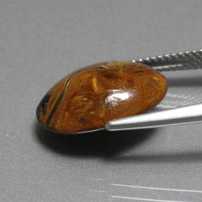 Pietersita multicolorido natural 6,36ct, corte oval, opaco