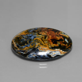 Pietersita multicolorido natural 24,42ct, corte oval, opaco