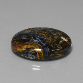 Pietersita multicolorido natural 41,01ct, corte oval, opaco
