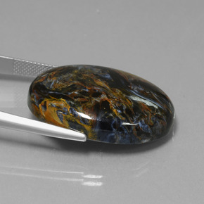 Pietersita multicolorido natural 41,01ct, corte oval, opaco