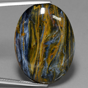 Pietersita multicolorido natural 26,41ct, corte oval, opaco