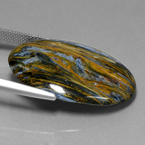 Pietersita multicolorido natural 26,41ct, corte oval, opaco