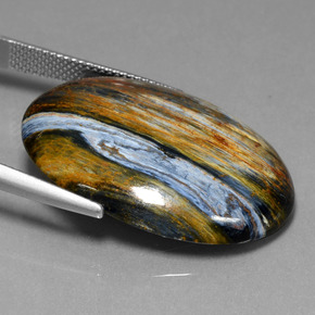 Pietersita multicolorido natural 27,95ct, corte oval, opaco
