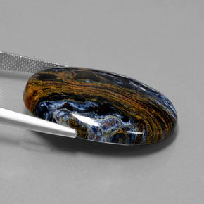 Pietersita multicolorido natural 28,85ct, corte oval, opaco