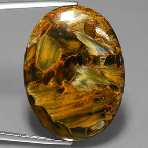 Pietersita multicolorido natural 25,72ct, corte oval, opaco