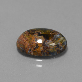 Pietersita multicolorido natural 4,11ct, corte oval, opaco