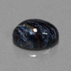 Pietersita multicolorido natural 6,21ct, corte oval, opaco