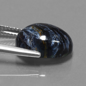 Pietersita multicolorido natural 6,21ct, corte oval, opaco