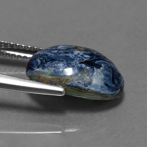 Pietersita multicolorido natural 4,33ct, corte oval, opaco