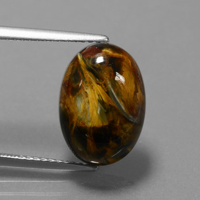 Pietersita multicolorido natural 6,15ct, corte oval, opaco