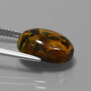 Pietersita multicolorido natural 6,15ct, corte oval, opaco
