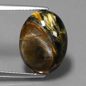 Pietersita multicolorido natural 6,62ct, corte oval, opaco