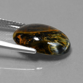 Pietersita multicolorido natural 6,62ct, corte oval, opaco