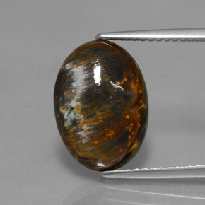 Pietersita multicolorido natural 3,83ct, corte oval, opaco