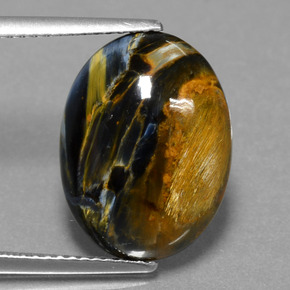 Pietersita multicolorido natural 6,41ct, corte oval, opaco