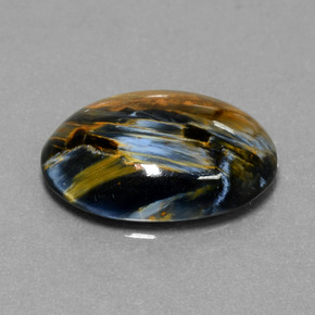 Pietersita multicolorido natural 6,41ct, corte oval, opaco