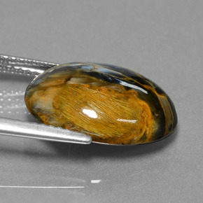 Pietersita multicolorido natural 6,41ct, corte oval, opaco