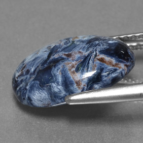 Pietersita multicolorido natural 3,89ct, corte oval, opaco
