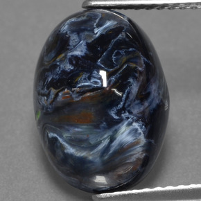 Pietersita multicolorido natural 5,89ct, corte oval, opaco