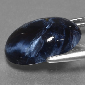 Pietersita multicolorido natural 5,07ct, corte oval, opaco