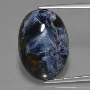 Pietersita multicolorido natural 10,63ct, corte oval, opaco