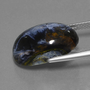 Pietersita multicolorido natural 10,63ct, corte oval, opaco