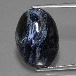 Pietersita multicolorido natural 10,97ct, corte oval, opaco
