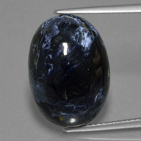 Pietersita multicolorido natural 12,22ct, corte oval, opaco