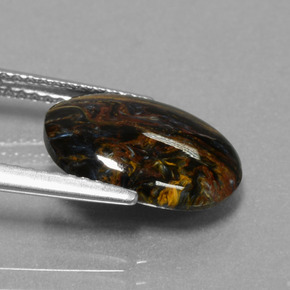 Pietersita multicolorido natural 3,16ct, corte oval, opaco