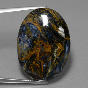 Pietersita multicolorido natural 27,94ct, corte oval, opaco