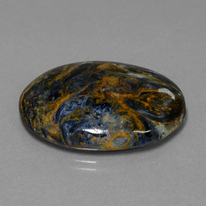 Pietersita multicolorido natural 27,94ct, corte oval, opaco