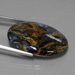Pietersita multicolorido natural 27,94ct, corte oval, opaco