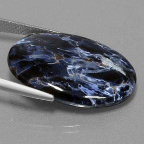 Pietersita multicolorido natural 27,49ct, corte oval, opaco