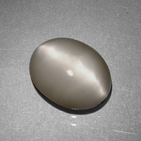 Quartz cat's eye creme natural 1,97ct, corte oval, opaco