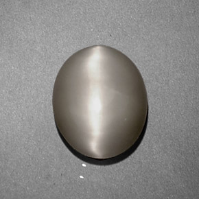 Quartz cat's eye creme natural 1,97ct, corte oval, opaco