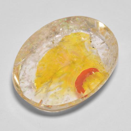 Quartzo com marcasita dourado natural 22,71ct, corte oval, transparente