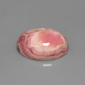 Rodocrosita multicolorido natural 7,08ct, corte oval, opaco