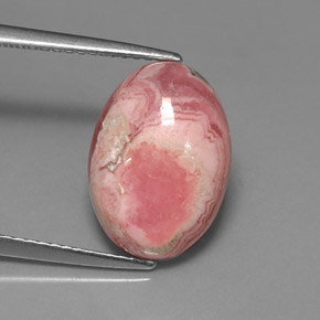 Rodocrosita multicolorido natural 7,08ct, corte oval, opaco