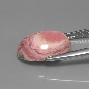 Rodocrosita multicolorido natural 7,08ct, corte oval, opaco